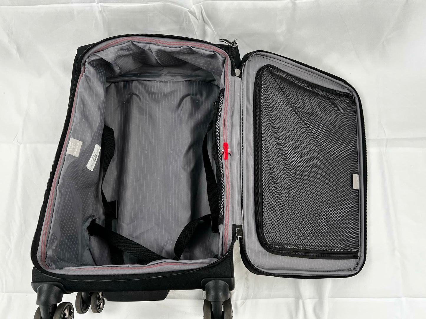 DELSEY Paris Softside Expandable Luggage with Spinner Wheels, Black. Large and - Very Good
